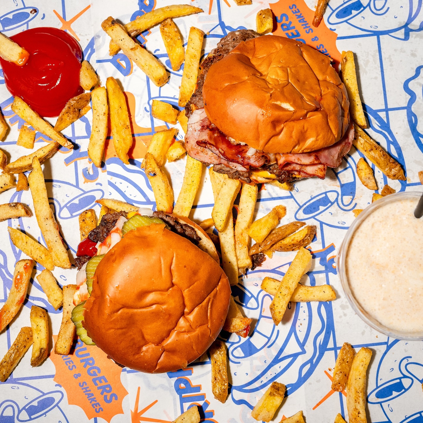 A plate of burgers and fries at Drippy's, a halal restaurant in Rotterdam, Netherlands.