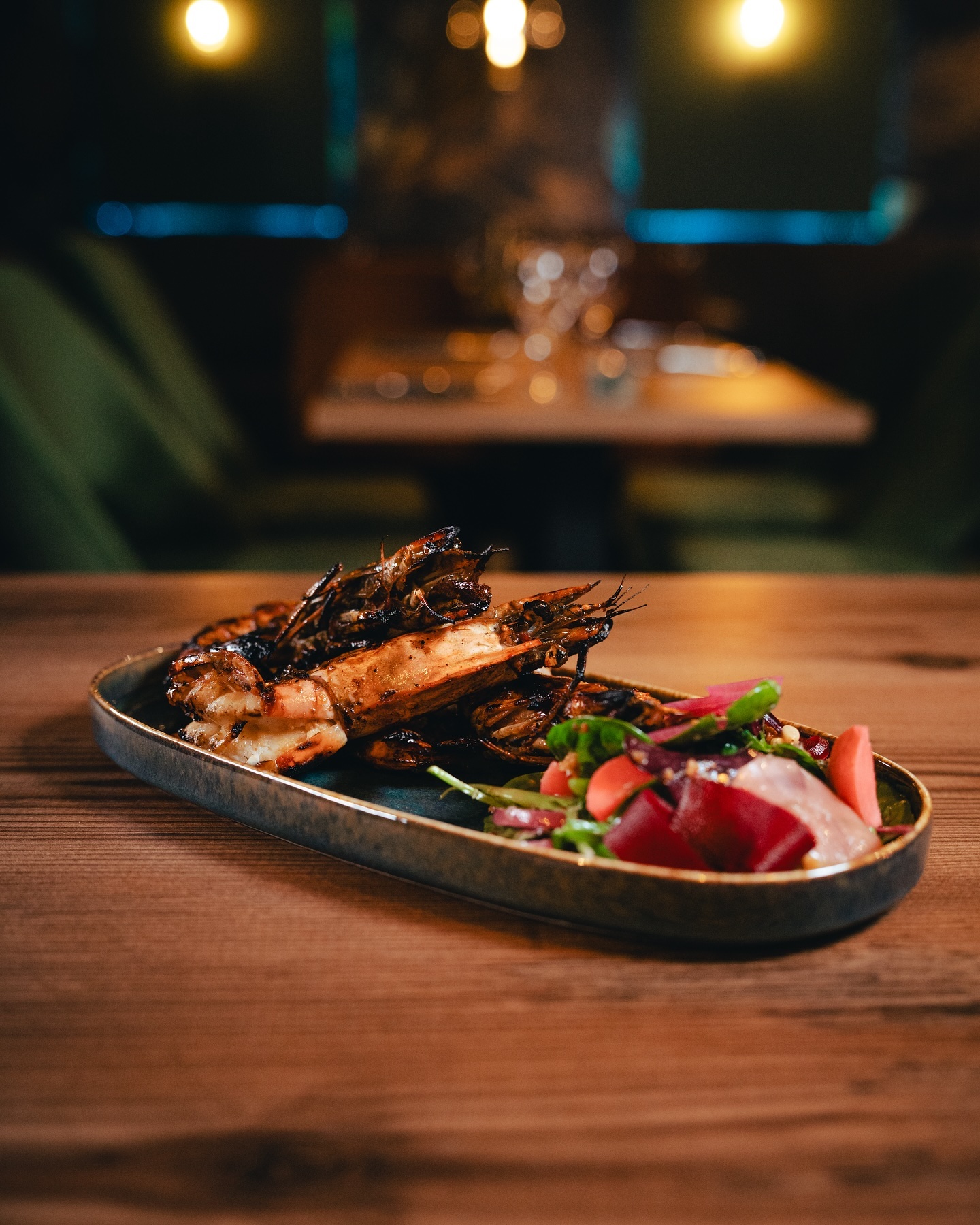 A plate of grilled prawns with a side salad at Seventeen, a halal restaurant in Antwerpen, Belgium.