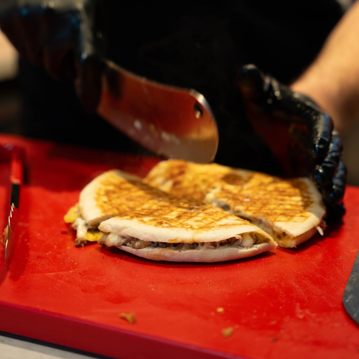 A grilled sandwich filled with meat and cheese at Toastup, a halal restaurant in Rotterdam, Netherlands.