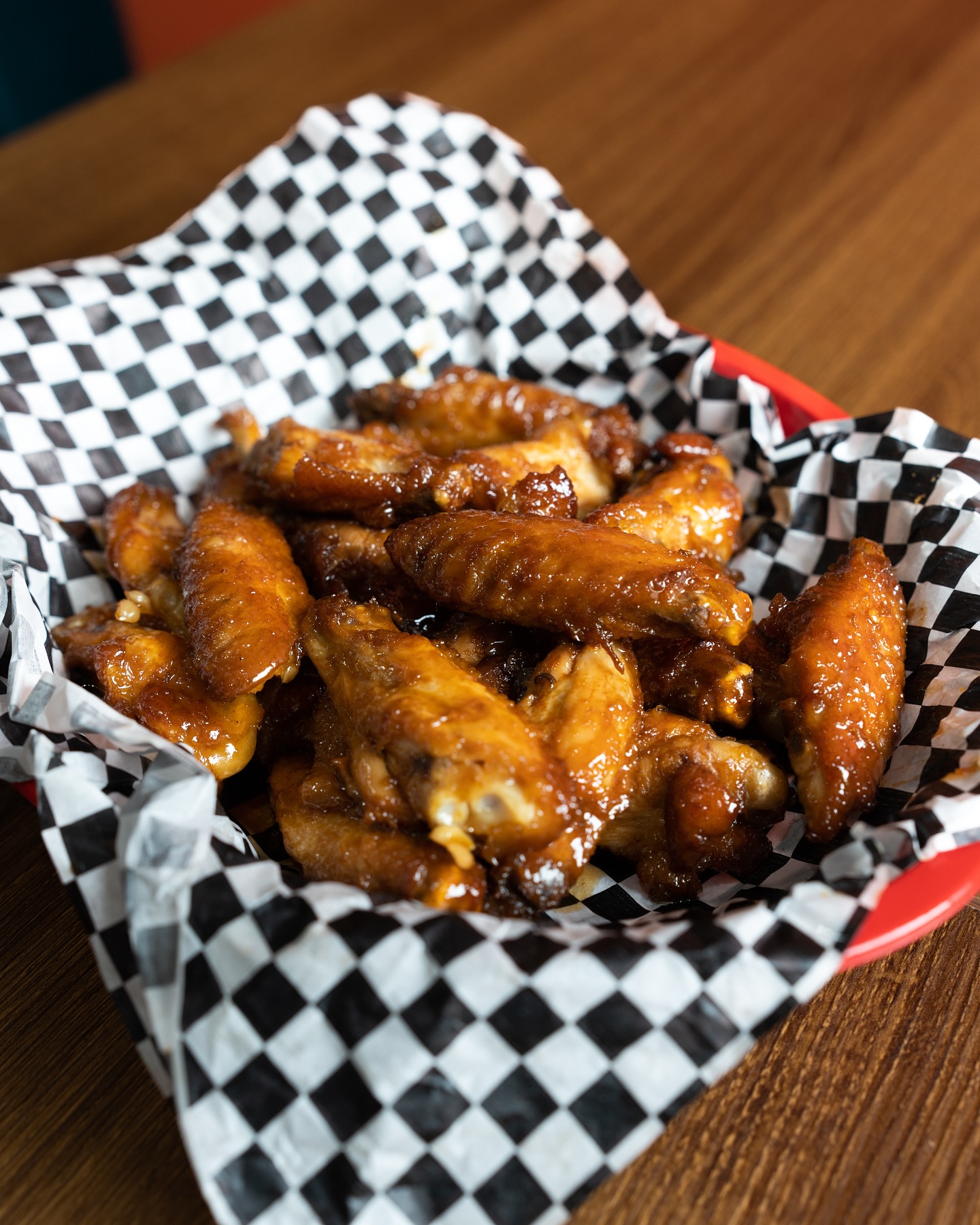 A plate of glazed chicken wings at Traphouse Food, a halal restaurant in Bruxelles, Belgium.