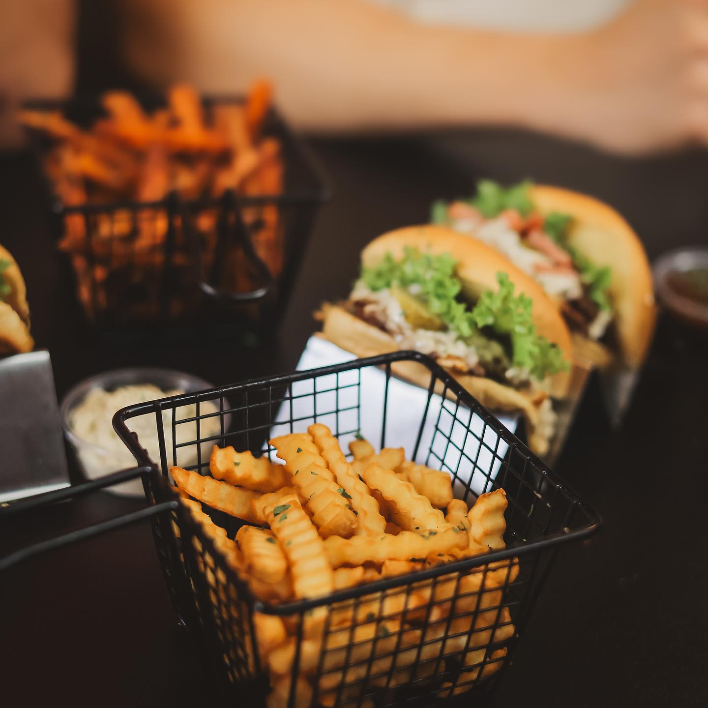 A basket of crinkle-cut fries at Nub Smashburger, a halal restaurant in Gent, Belgium.