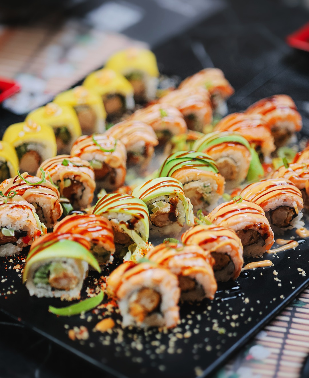 A colorful assortment of sushi rolls at Sensei Sushi, a halal restaurant in Schaerbeek, Belgium.
