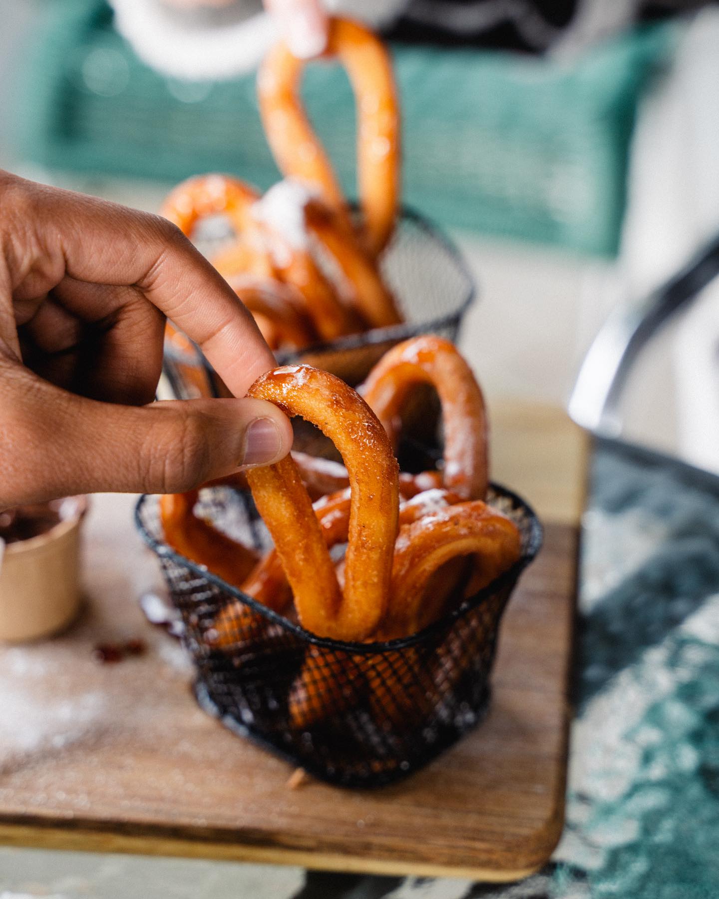 A basket of churros dusted with sugar at Taco's and burgers, a halal restaurant in Amsterdam, Netherlands.