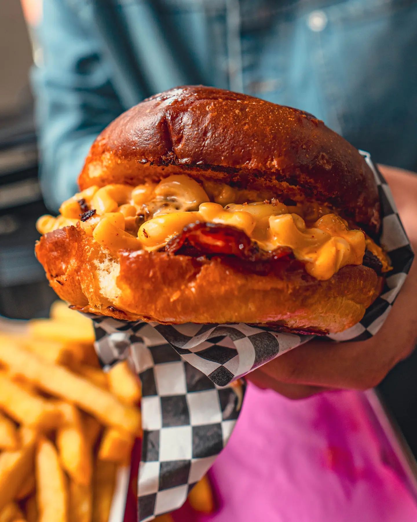 A burger with macaroni and cheese and bacon at Bad Bun, a halal restaurant in Ixelles, Belgium.