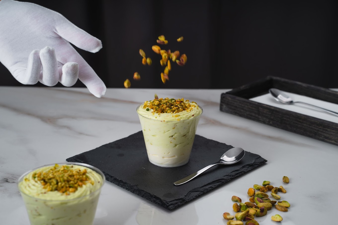 A dessert topped with pistachios at Wokbox, a halal restaurant in Antwerpen, Belgium.
