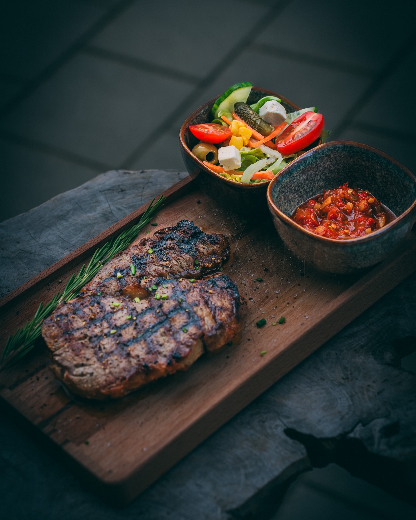 A grilled steak with a side salad and sauce at Malva, a halal restaurant in Amsterdam, Netherlands.