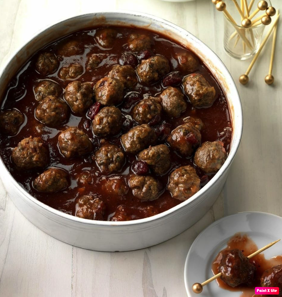 A plate of meatballs in a rich sauce at Leuven Chicken and Rice, a halal restaurant in Leuven, Belgium.