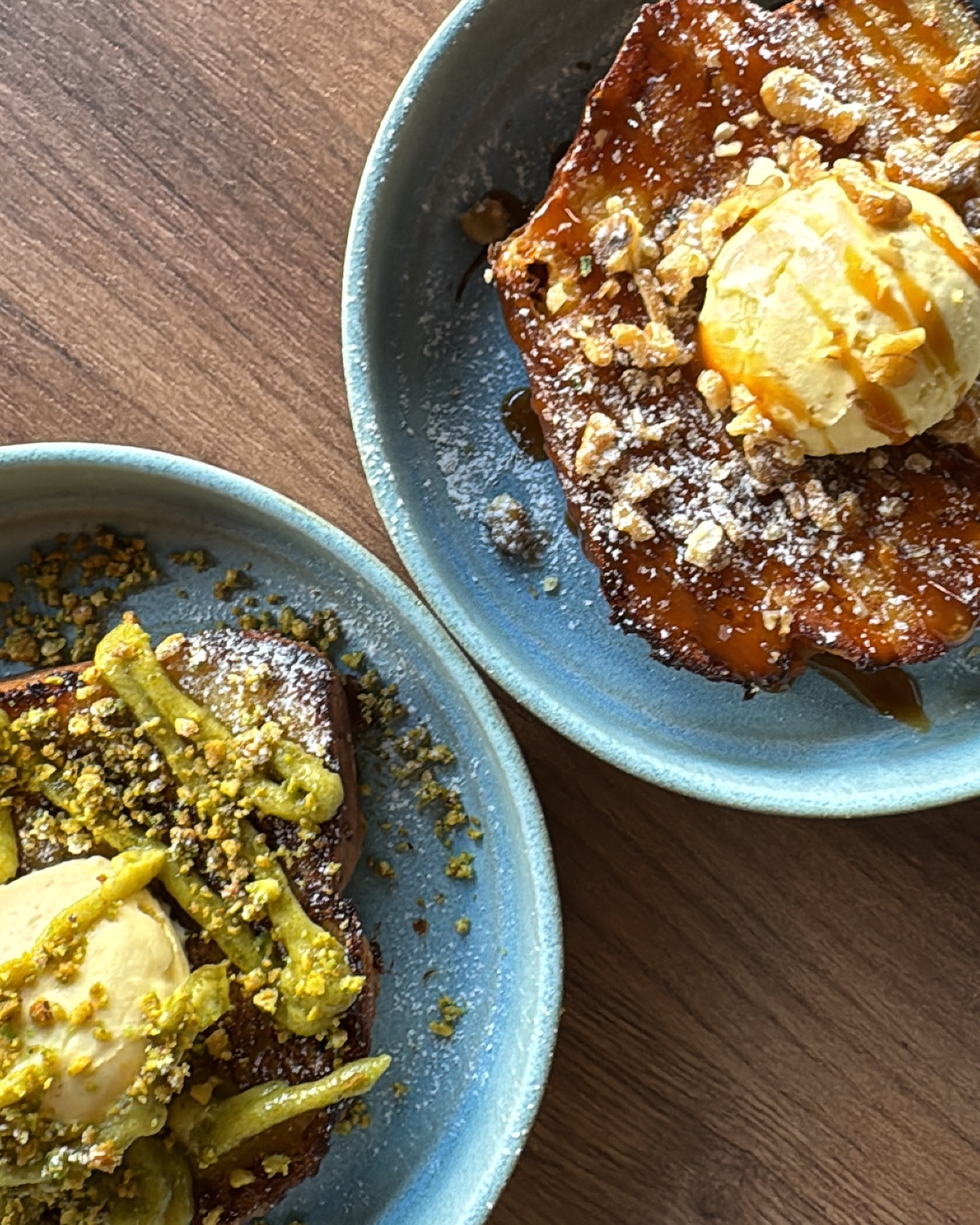 A plate of French toast topped with ice cream, crushed nuts, and a drizzle of syrup at Baba Brunch, a halal restaurant in Koekelberg, Belgium.